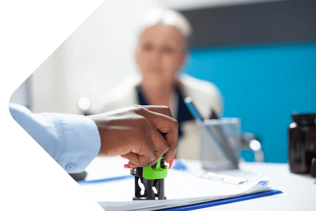 GP Locum Doctor Stamping Patient Records