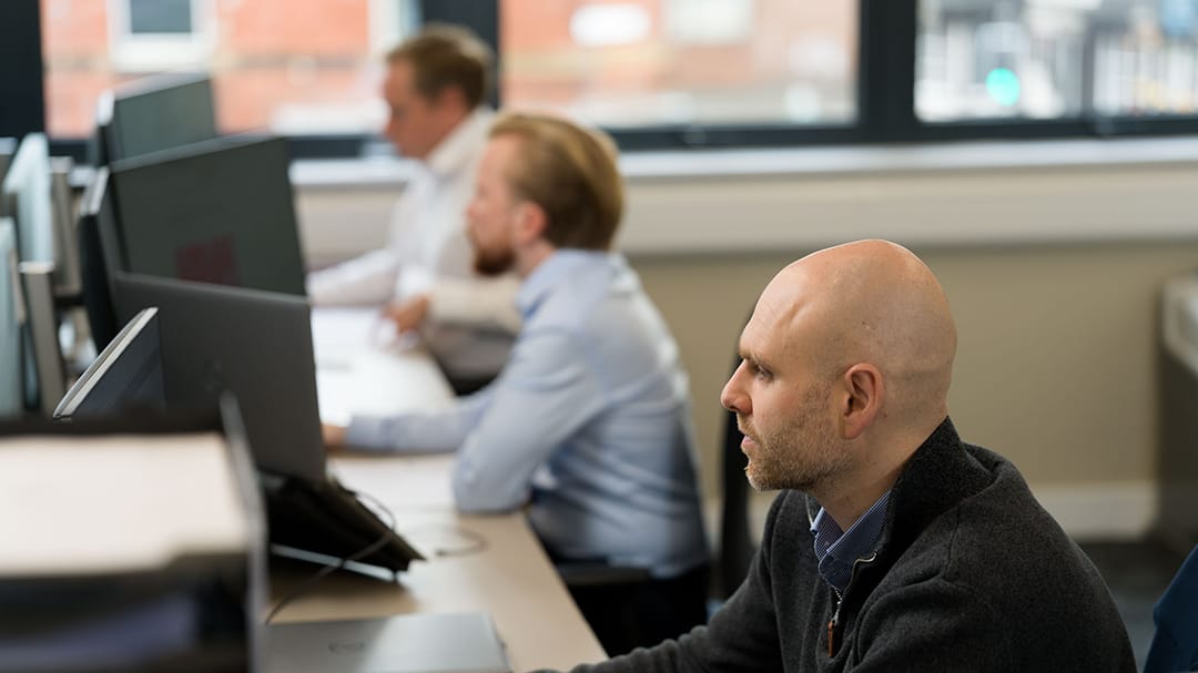 Hawsons wealth management team working - cropped 16-9 Hawsons Wealth Management Team working