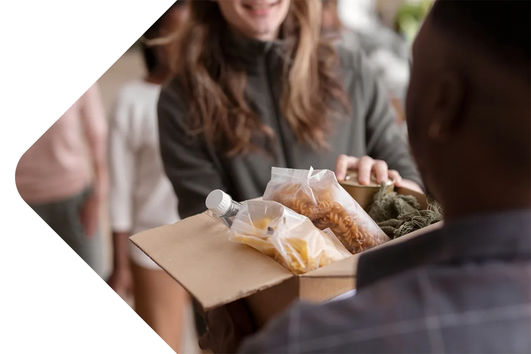 someone donating food to a charity