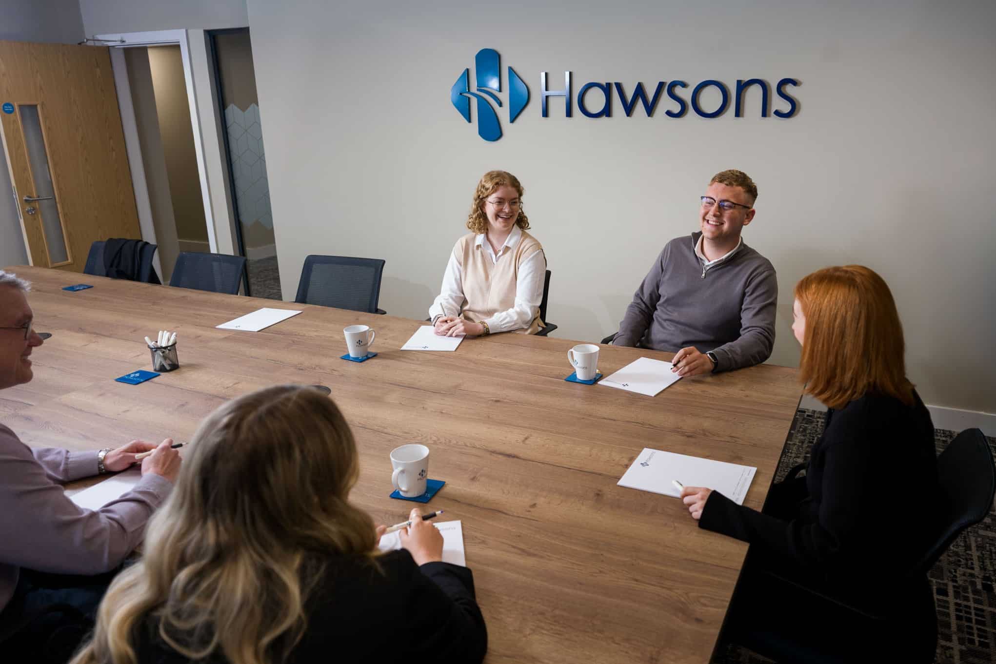 Hawsons team meeting in the board room HLB become top 10 network